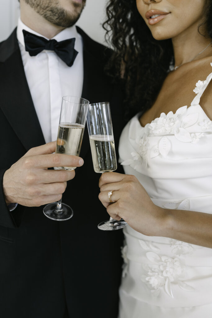 champagne toast between the bride and the groom.
