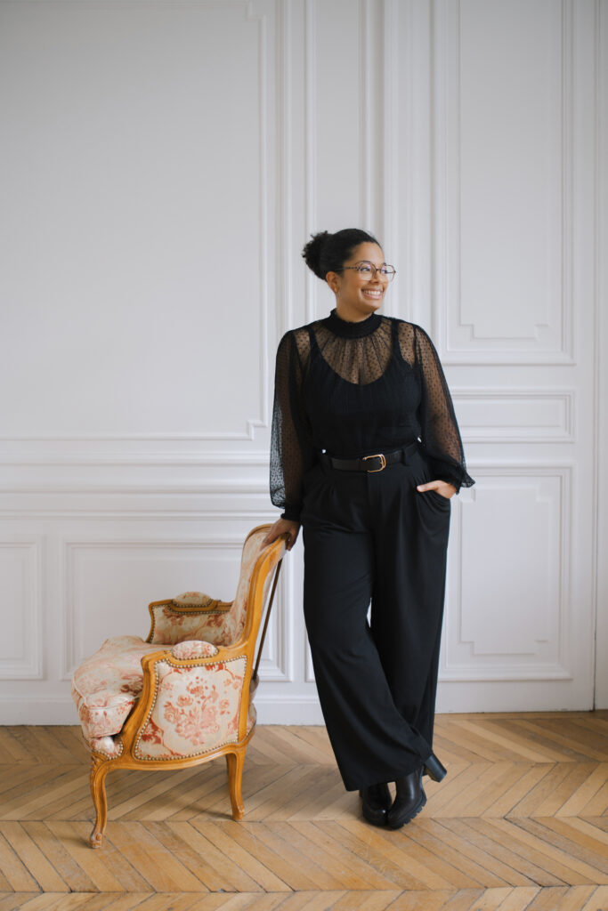 Marie-svetlana, destination wedding planner paris standing in a chateau
